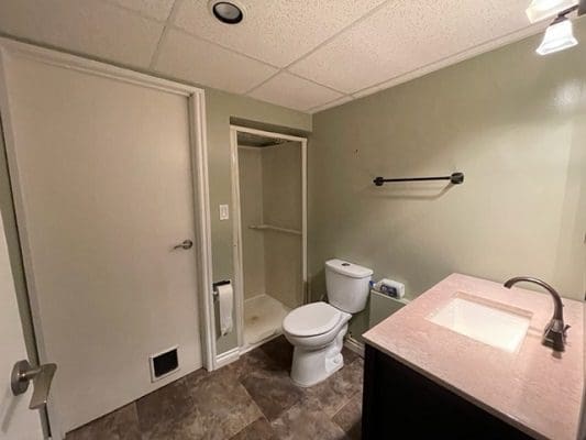 A small bathroom with a toilet and sink.