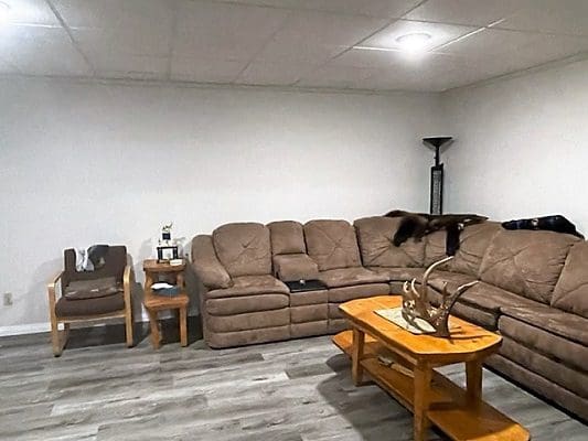 A living room with a couch and coffee table.