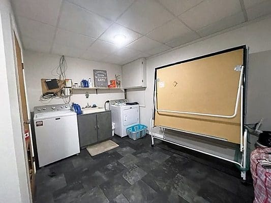 A laundry room with a washer and dryer.