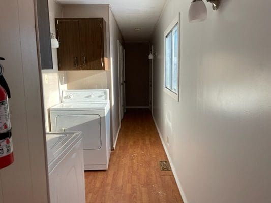 A laundry room with a washer and dryer.