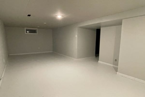 A room with white walls and a white floor.