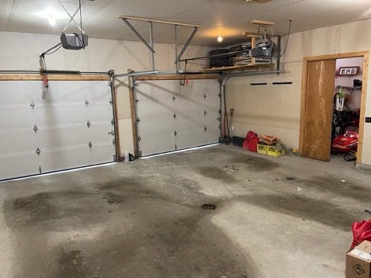 A garage with a lot of equipment in it.