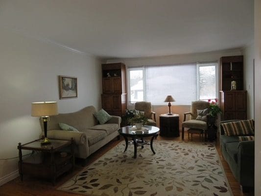 A living room with couches and a coffee table.