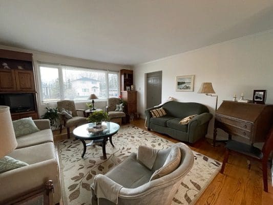 A living room with couches and a coffee table.