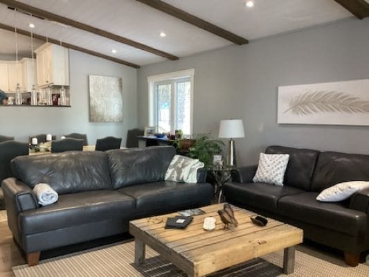 A living room with couches and a coffee table.