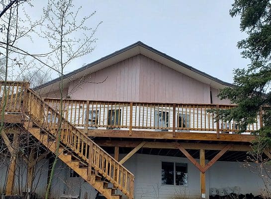 House With Elevated Wooden Deck