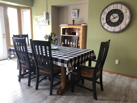Dining Area With a Black Dining Table and Black Chairs