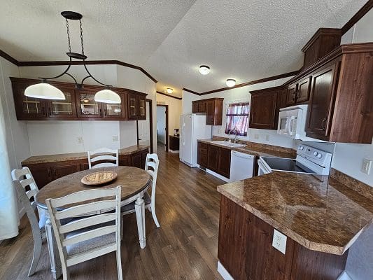 Kitchen with dining area and island.