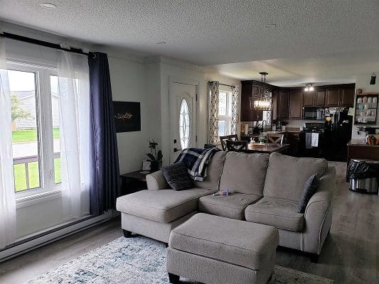 Spacious living room with sectional sofa.