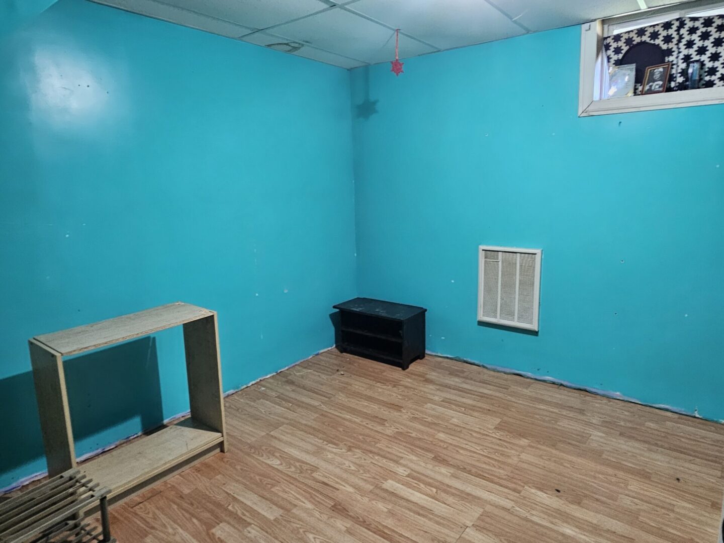 Blue Room With Wooden Floors