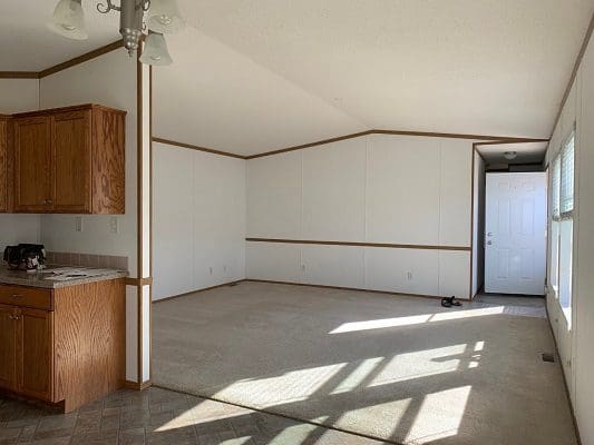 Empty living room in mobile home.