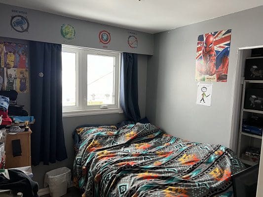Boy's bedroom with superhero decor.