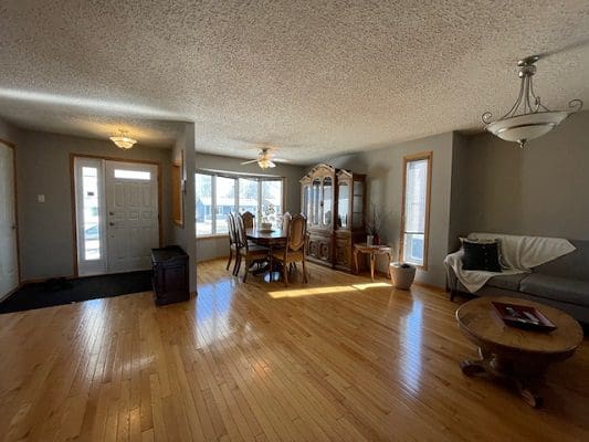 Spacious home interior with hardwood floors.