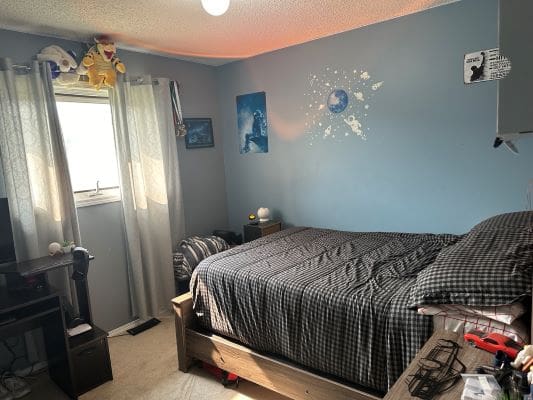 Boy's bedroom with a space theme.