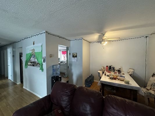 Apartment living room with dining area.