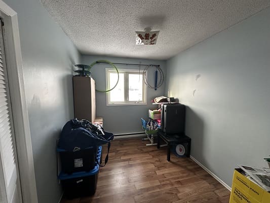 Spare room with storage and toys.