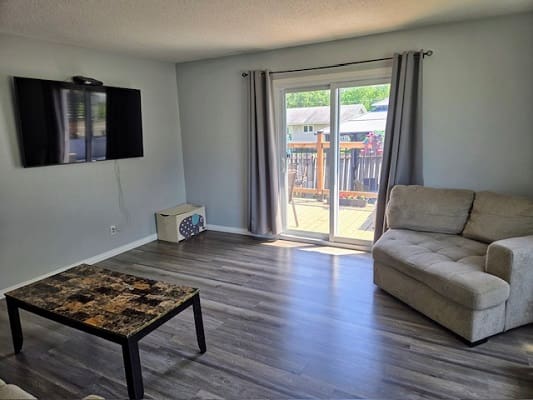 Modern living room with patio view.