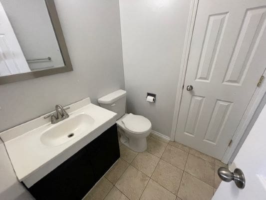 Small bathroom with sink and toilet.