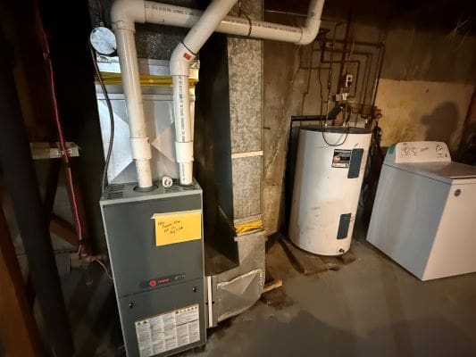 Basement furnace, water heater, and washing machine.