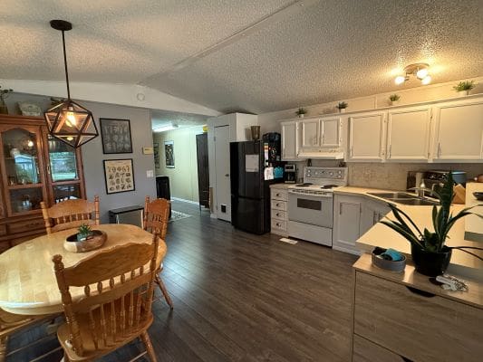 Cozy kitchen and dining area with decor.