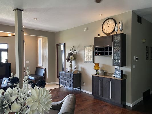 Modern living room with decorative wall elements.