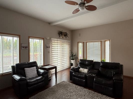 Cozy living room with leather furniture.