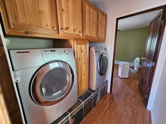 Laundry room with washer and dryer.