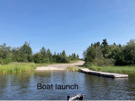 Boat launch with clear blue sky.