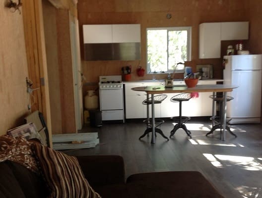 Cozy kitchen with island and seating.