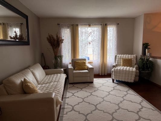 Cozy living room with beige furniture.