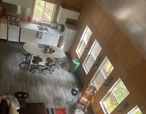 Modern kitchen and dining area, aerial view.