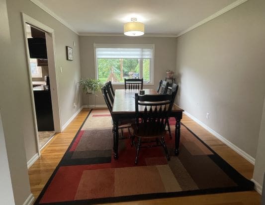 Dining room with table and chairs.
