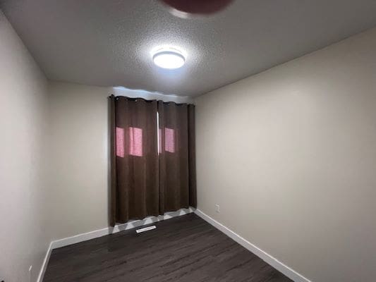 Empty room with brown curtains and light.