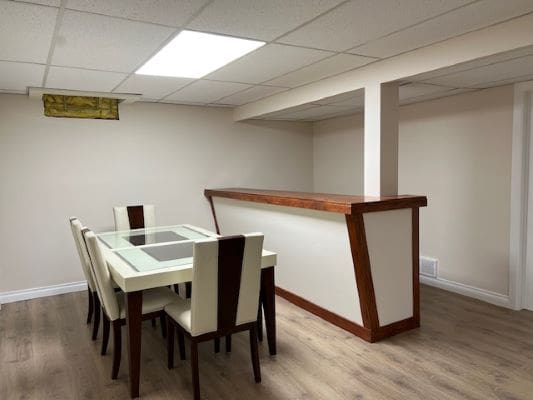 Dining area with table and chairs.