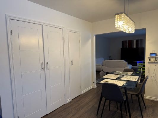 Dining area with modern decor and table.