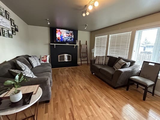 Cozy living room with gray sofas.