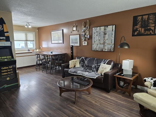 Cozy living room with brown decor.